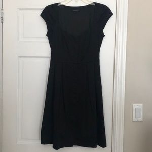 Cap sleeve black dress with pockets